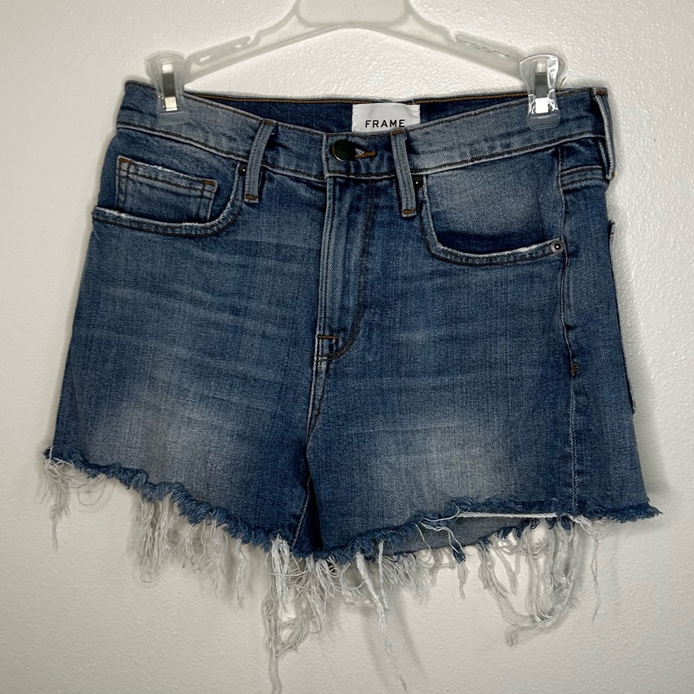 Frame Le Bridgette cut off ripped hem denim shorts